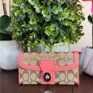 Coach Pink signature canvas wallet with turn lock